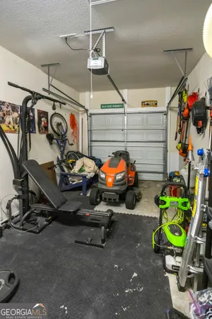 a view of a garage with a table and a couch