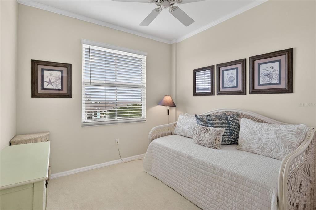 2060 Matecumbe Key Road, Unit 2506 Punta Gorda, FL 33955 - Photo 23 of 38 a bedroom with a bed and a window