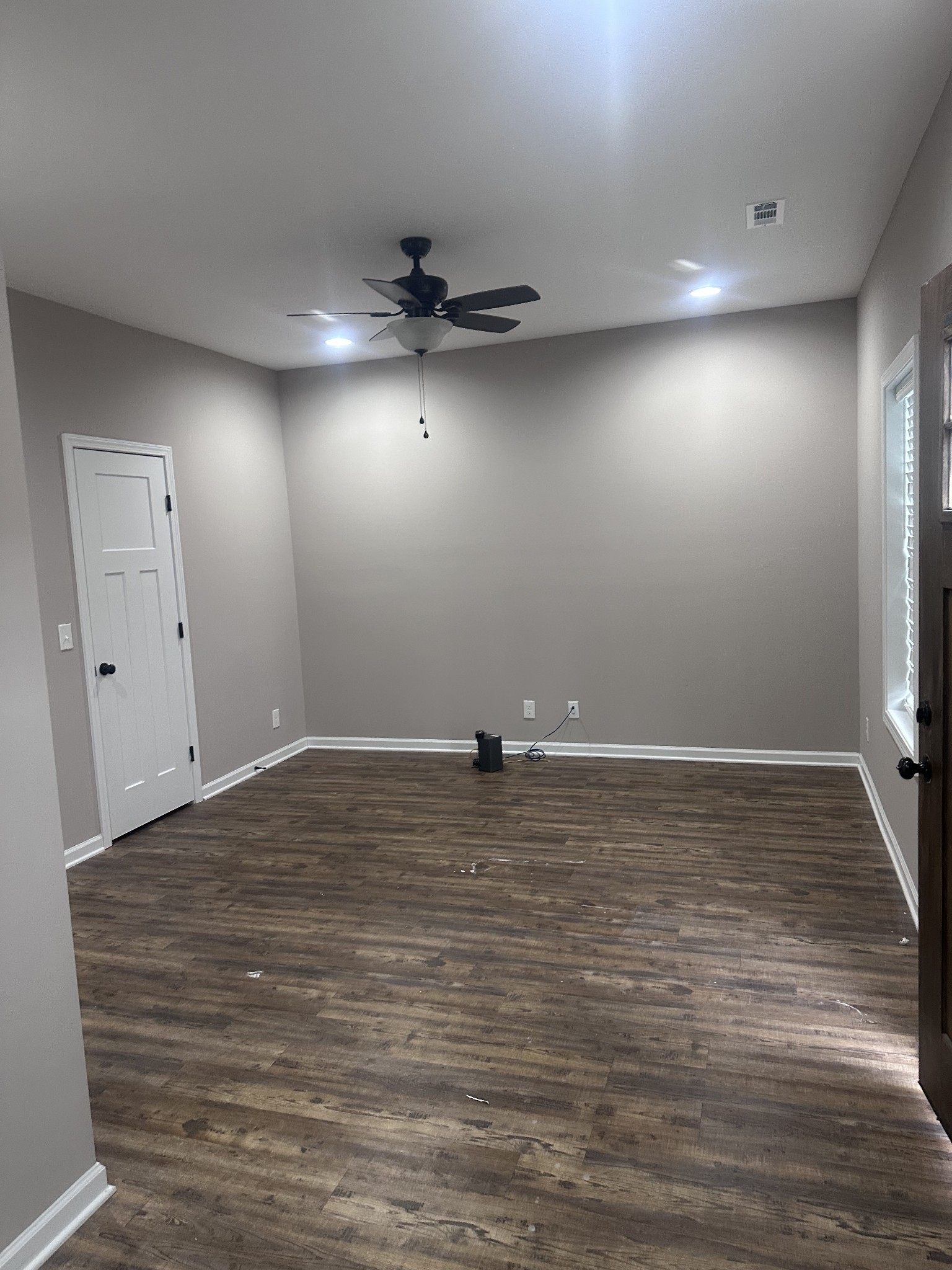121 McDale Road, Unit 403 Shelbyville, TN 37160 - Photo 5 of 6 a view of a room with wooden floor and ceiling fan