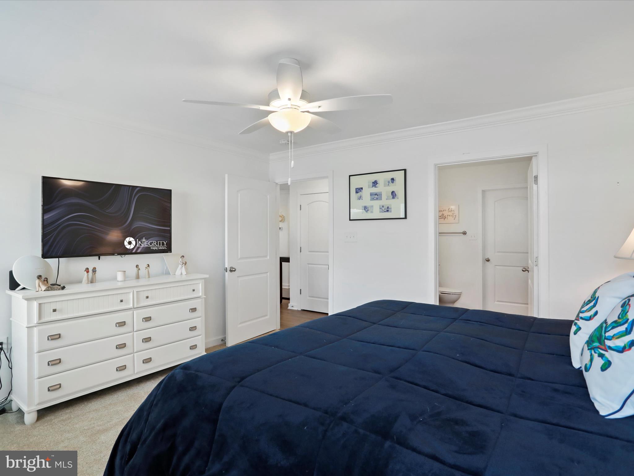 791 Dripping Spring Drive Hammondsville, OH 43930 - Photo 21 of 33 a bedroom with a bed and a flat screen tv