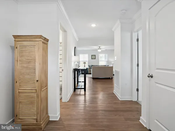 a view of a kitchen from the hallway