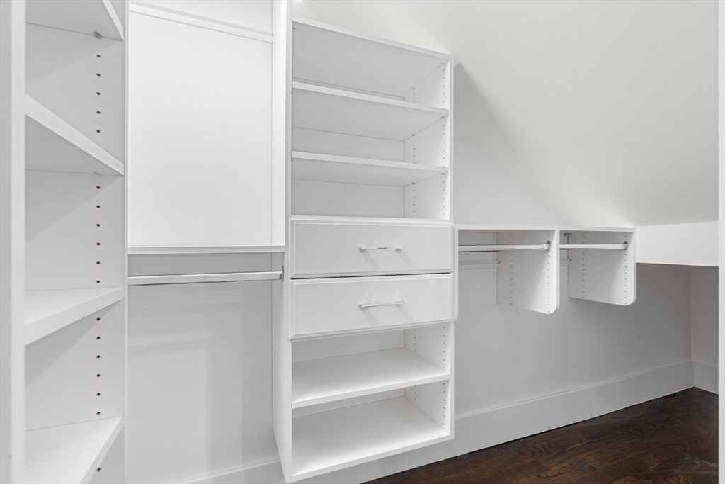 111 Winthrop Road, Unit 1 Brookline, MA 02445 - Photo 16 of 20 a view of walk in closet with empty racks