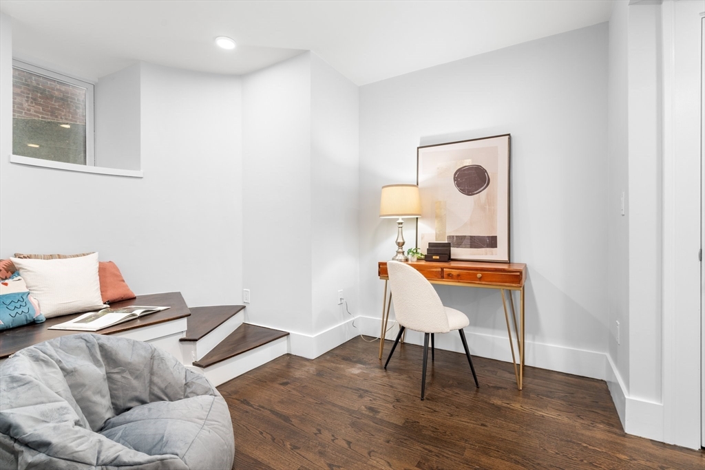 111 Winthrop Road, Unit 1 Brookline, MA 02445 - Photo 19 of 20 a living room with furniture and a wooden floor