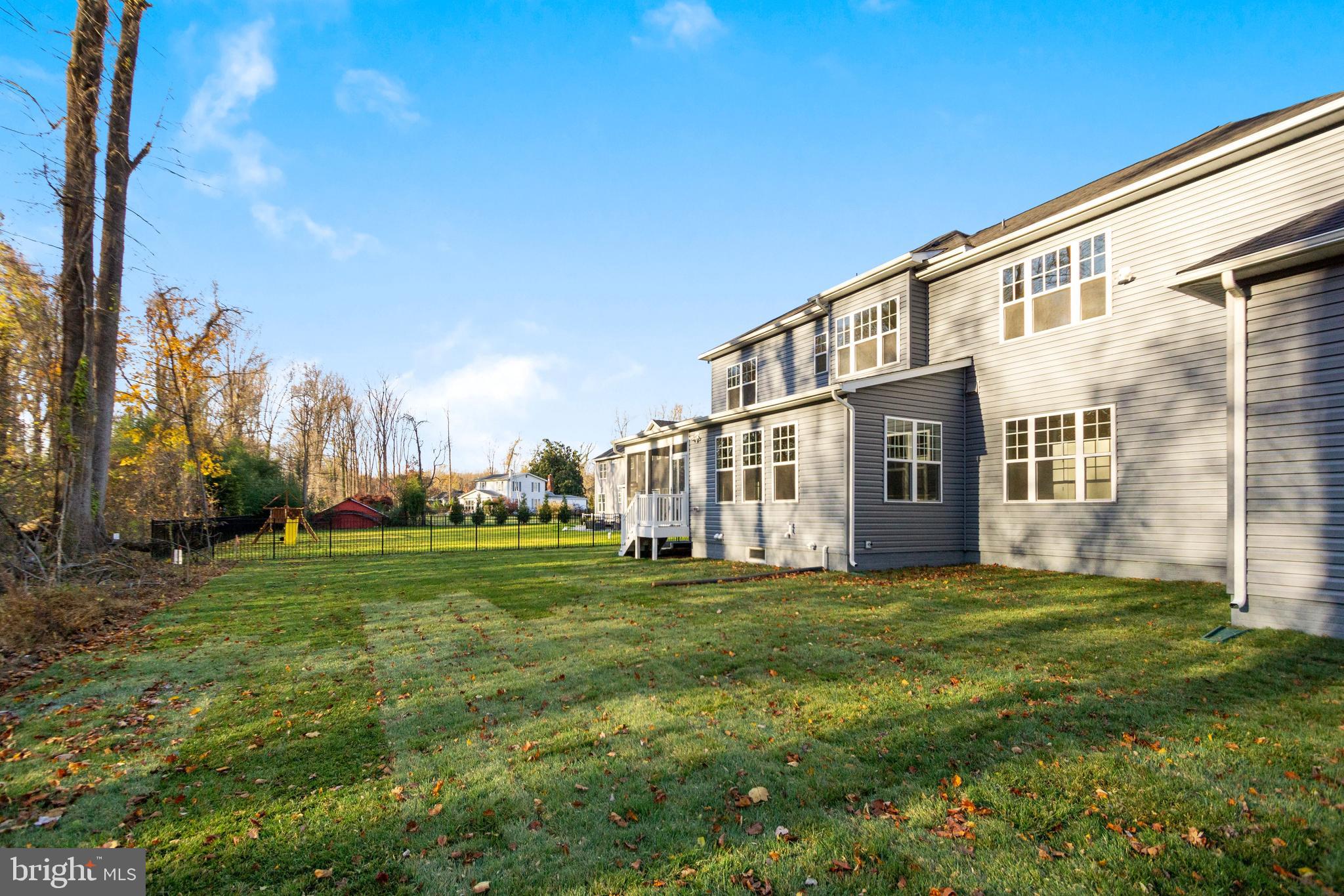 7327 Wisteria Point Drive, Unit 34 Hanover, MD 21076 - Photo 24 of 36 a view of a house with a big yard