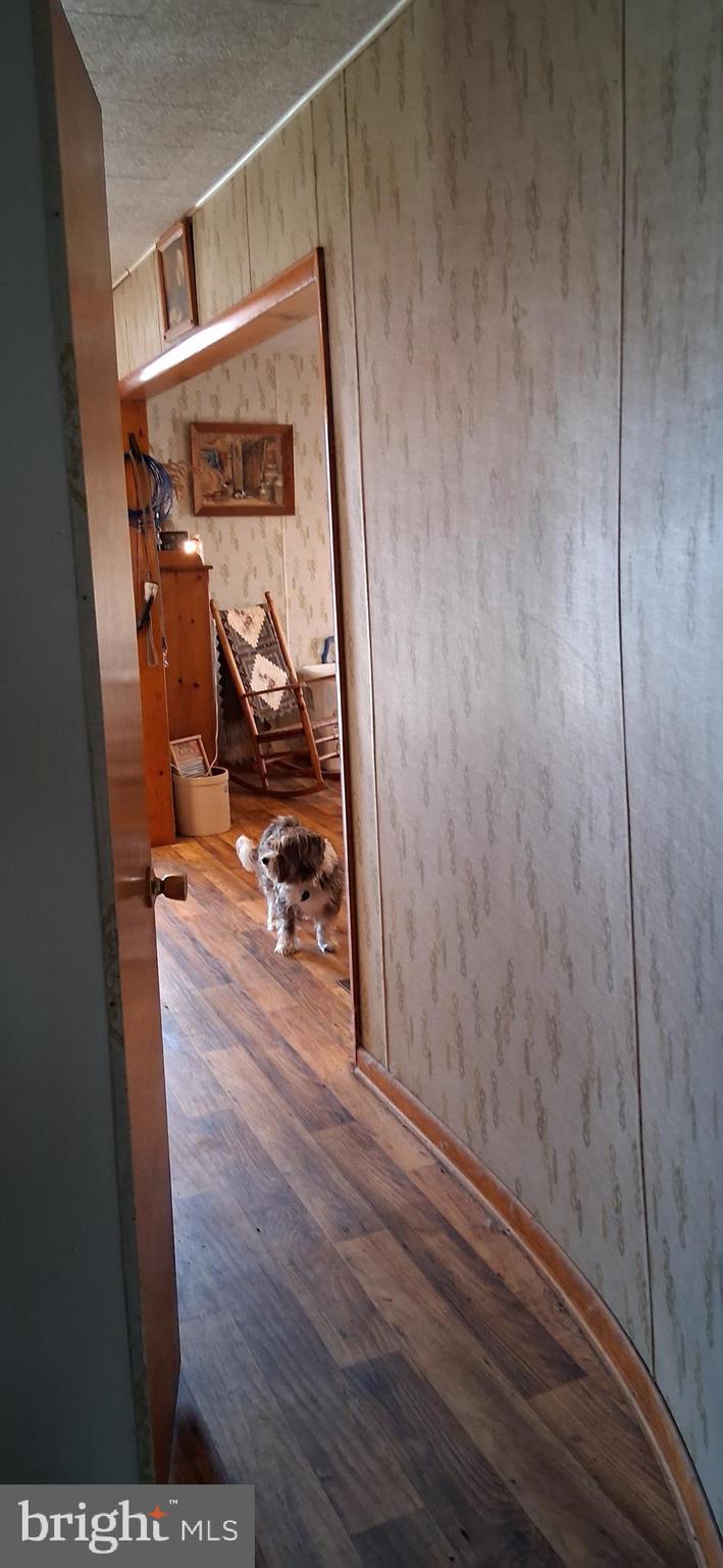 1927 Cumberland Road Bedford, PA 15522 - Photo 31 of 61 a view of a hallway with wooden floor