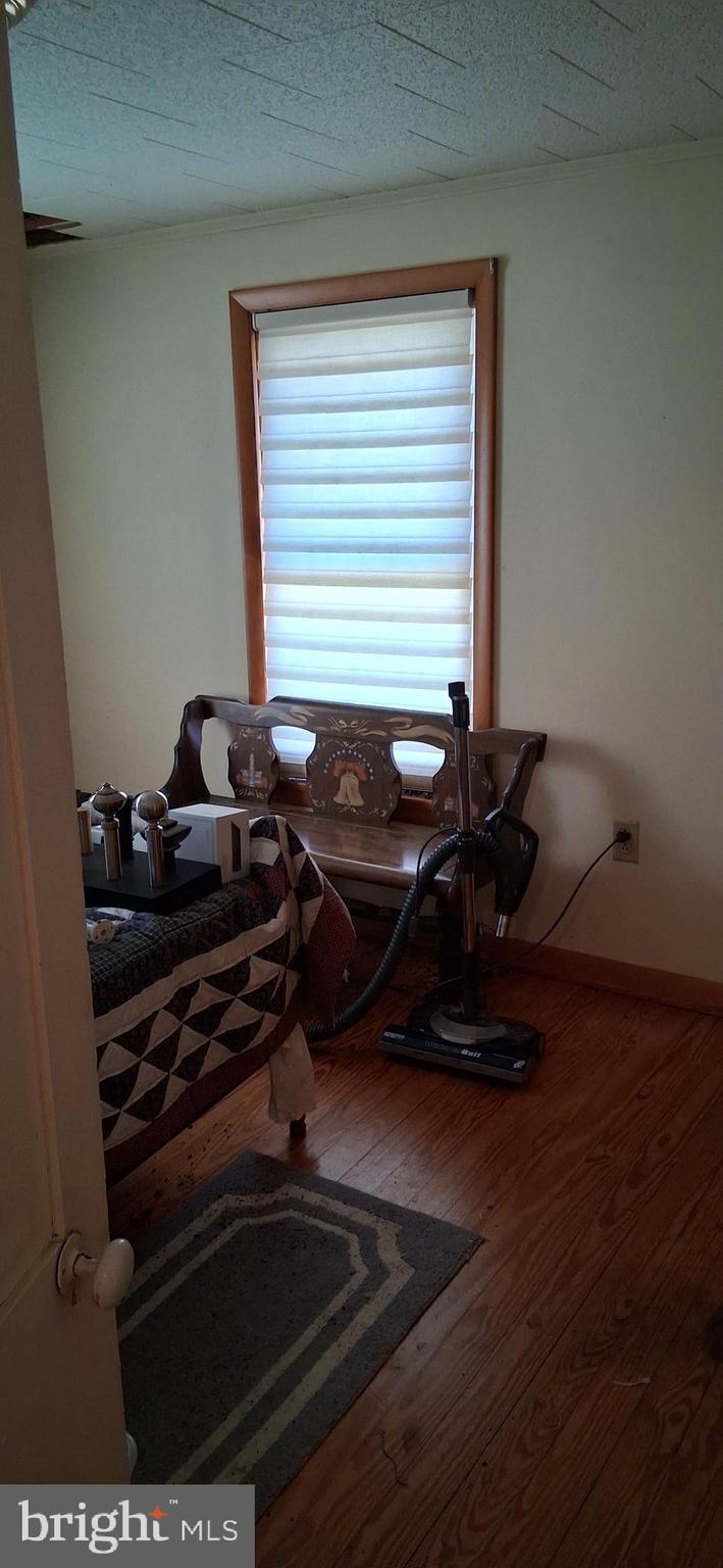 1927 Cumberland Road Bedford, PA 15522 - Photo 57 of 61 a room with wooden floor and a window
