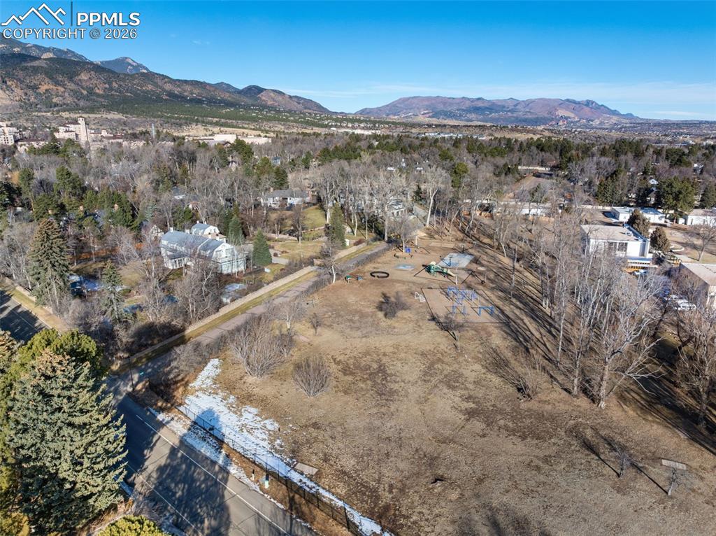Pourtales Road Colorado Springs, CO 80906 - Photo 10 of 44 a view of a forest with mountains in the background