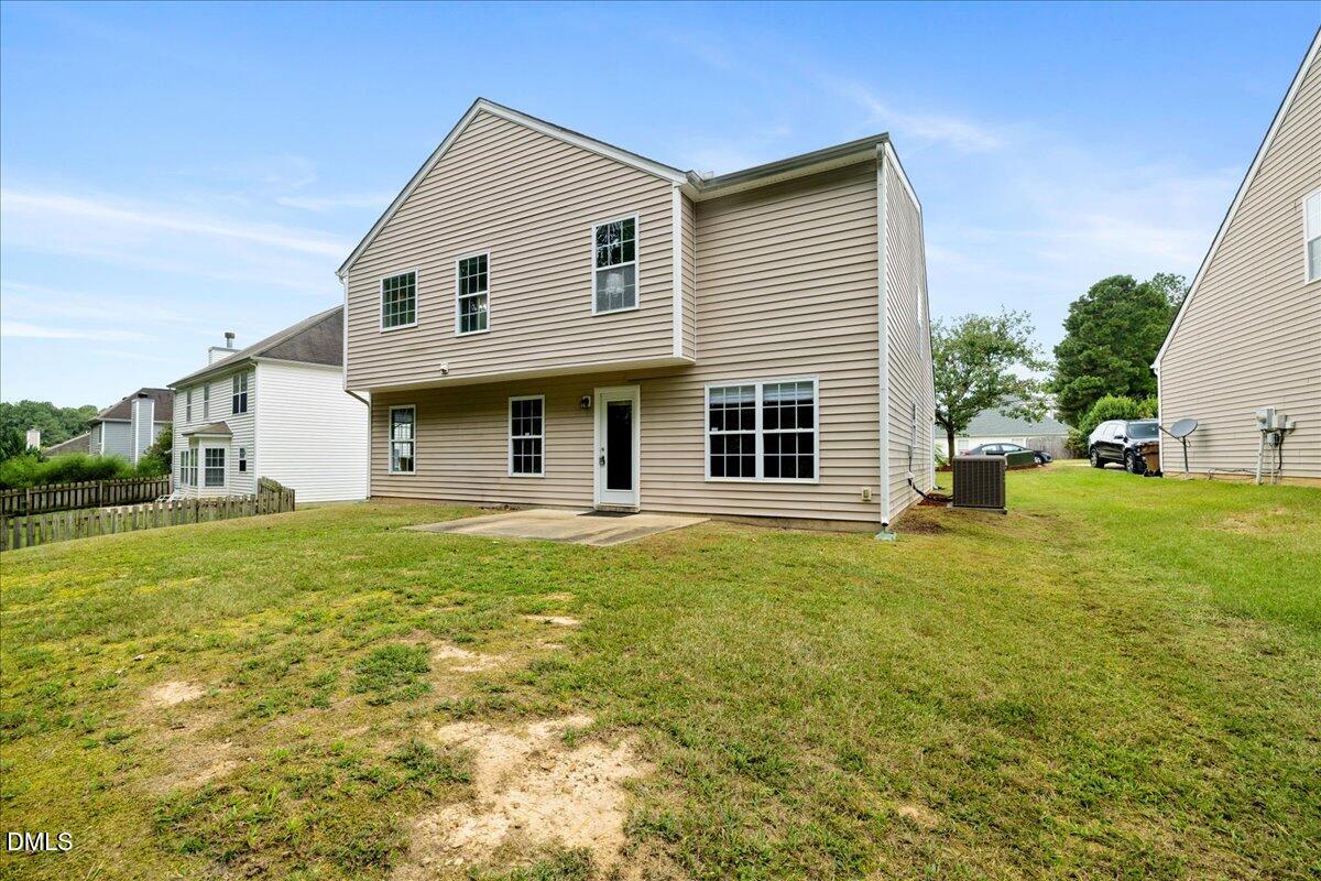505 Pyracantha Drive Holly Springs, NC 27540 - Photo 29 of 41 a front view of a house with a yard