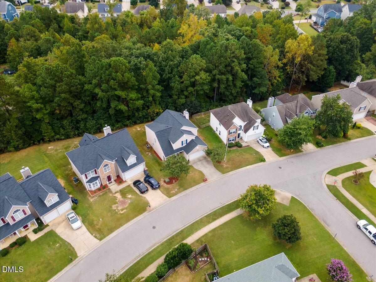 505 Pyracantha Drive Holly Springs, NC 27540 - Photo 34 of 41 an aerial view of a house with garden space and street view