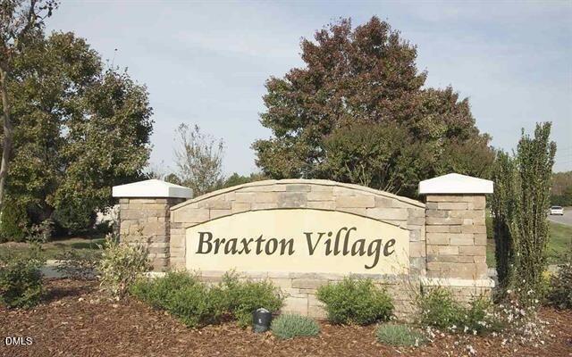 505 Pyracantha Drive Holly Springs, NC 27540 - Photo 38 of 41 a sign that is on the side of a road