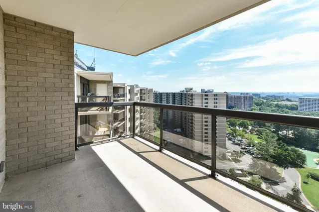 a view of a lake from a balcony