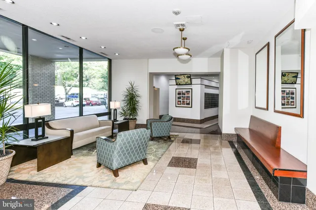 a view of a car parked in front of a building