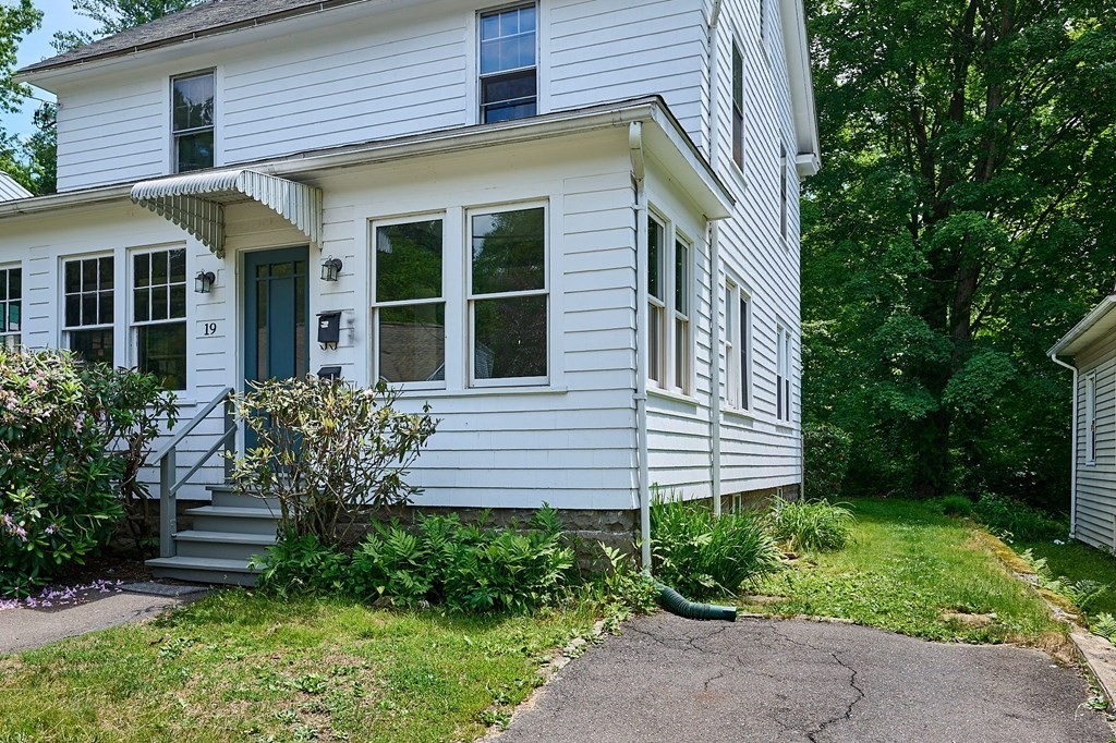 19 Powell Street Northampton, MA 01062 - Photo 27 of 40 a front view of a house with garden