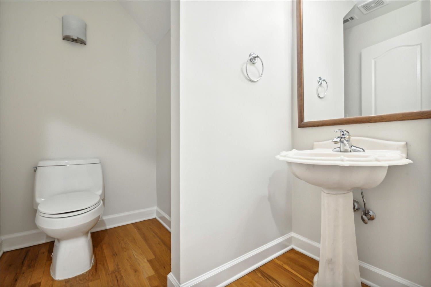 9128 Raspberry Lane Cordova, TN 38016 - Photo 23 of 32 a bathroom with a sink toilet and a mirror