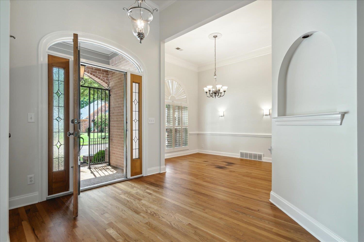 9128 Raspberry Lane Cordova, TN 38016 - Photo 5 of 32 a view of an entryway with wooden floor