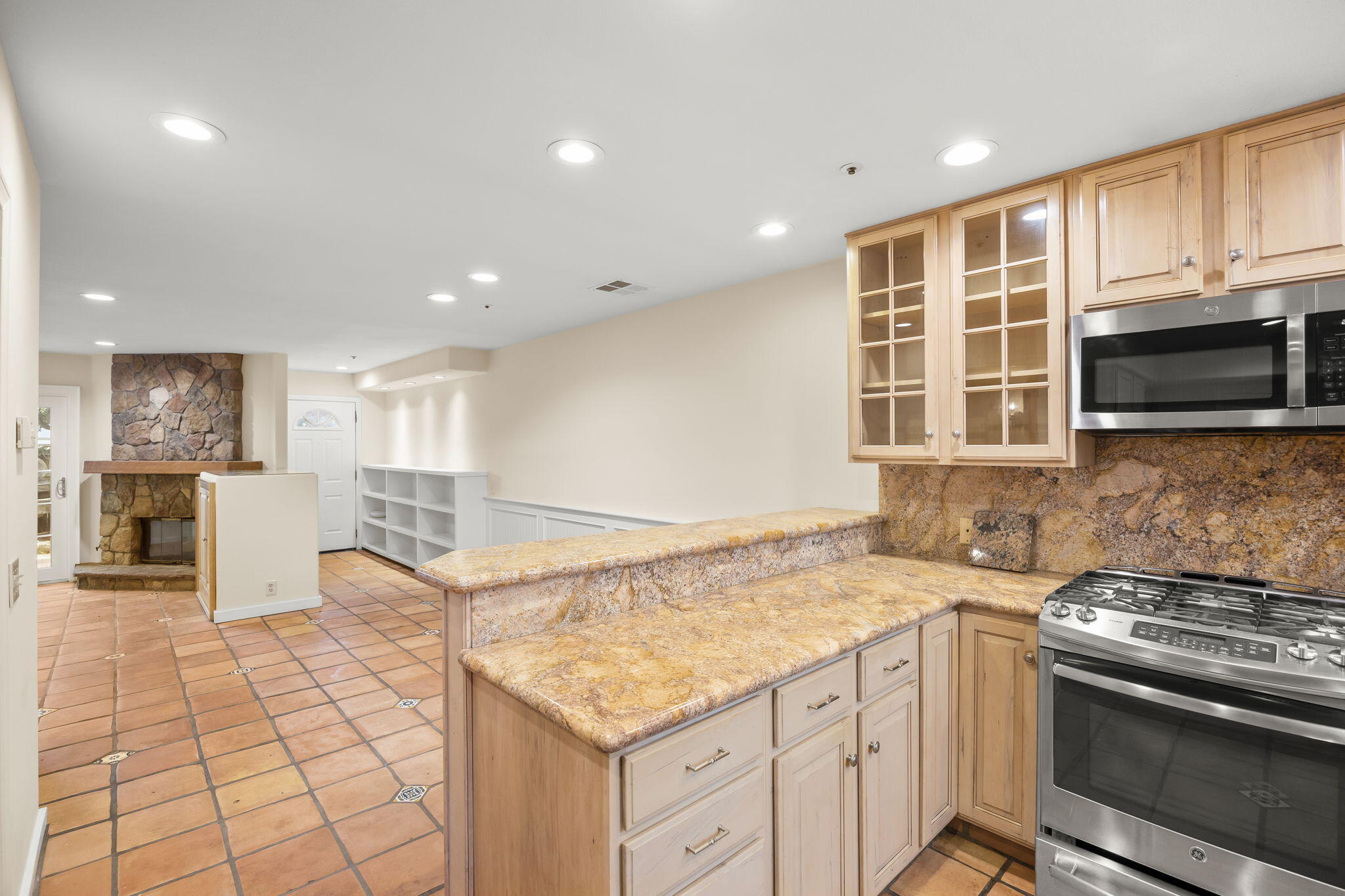 4228 Carpinteria Avenue, Unit 2 Carpinteria, CA 93013 - Photo 13 of 32 a kitchen with a stove and a sink