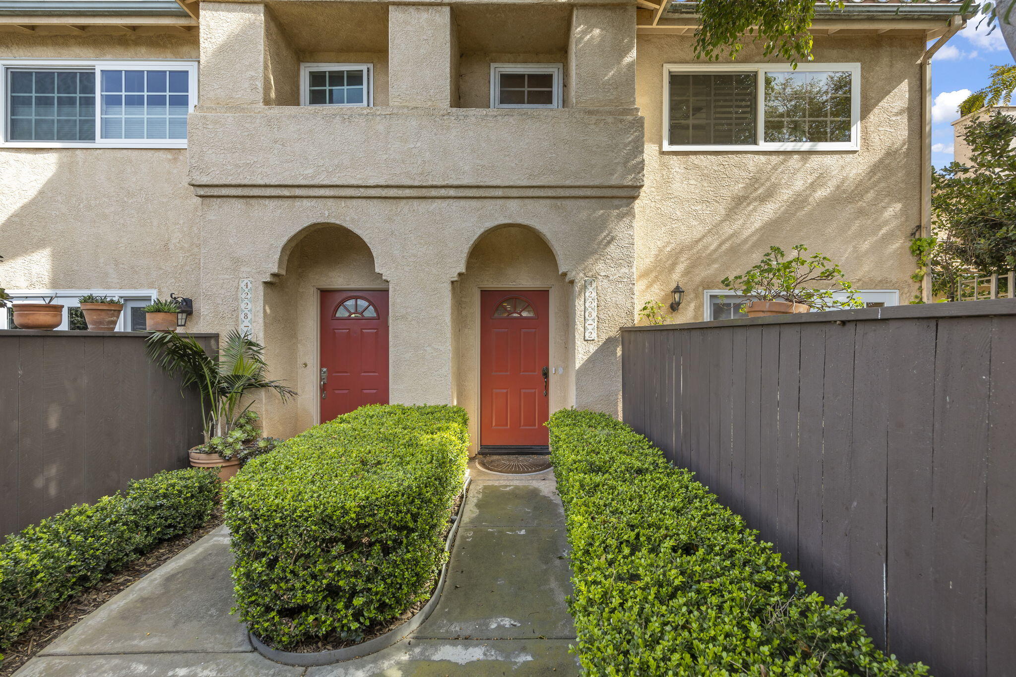 4228 Carpinteria Avenue, Unit 2 Carpinteria, CA 93013 - Photo 3 of 32 a front view of a house with garden