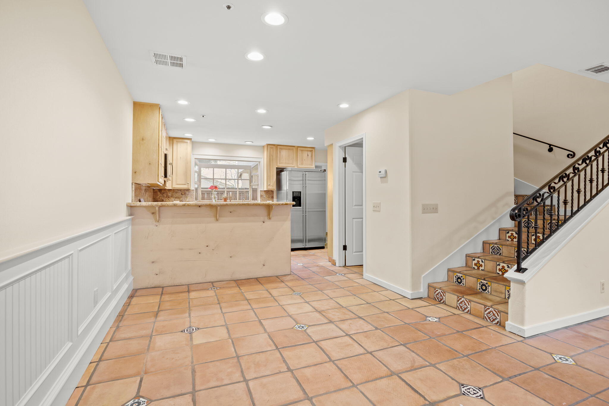 4228 Carpinteria Avenue, Unit 2 Carpinteria, CA 93013 - Photo 6 of 32 a view of a kitchen with wooden floor and electronic appliances