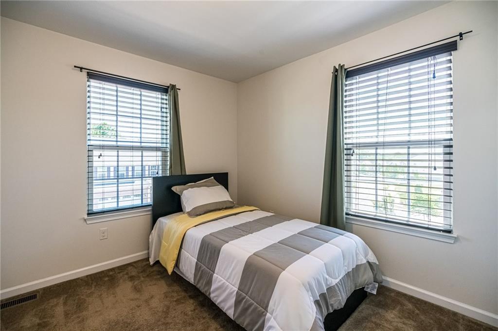 319 Rosecliff Road Wexford, PA 15090 - Photo 23 of 25 Guest Bedroom - Large Windows and Closet. Neutral Decor