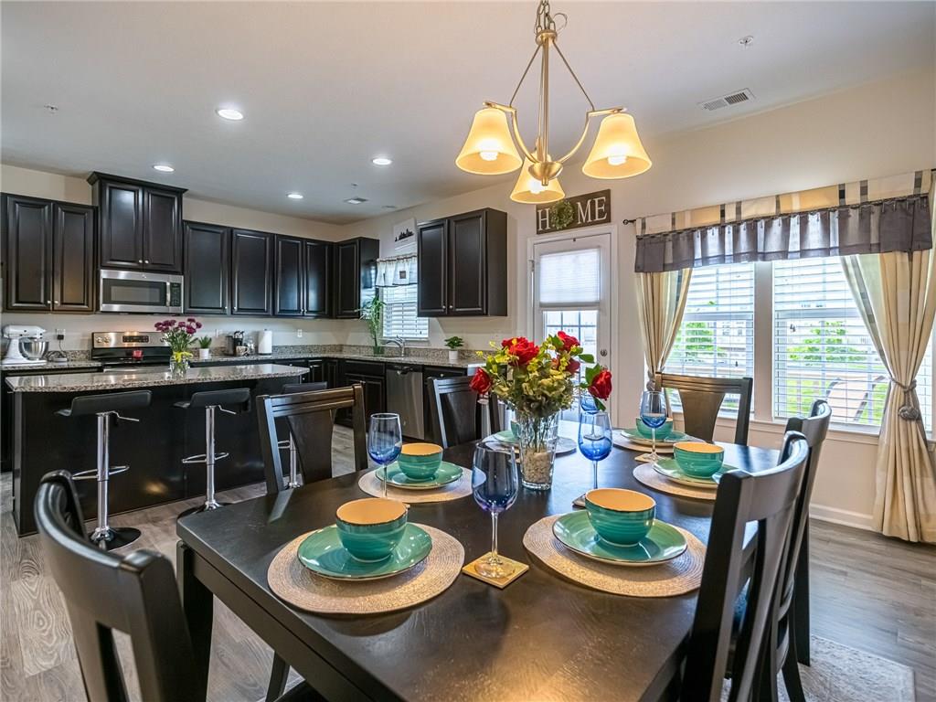 319 Rosecliff Road Wexford, PA 15090 - Photo 8 of 25 9' Ceilings, French Door to Deck and Windows Add Light