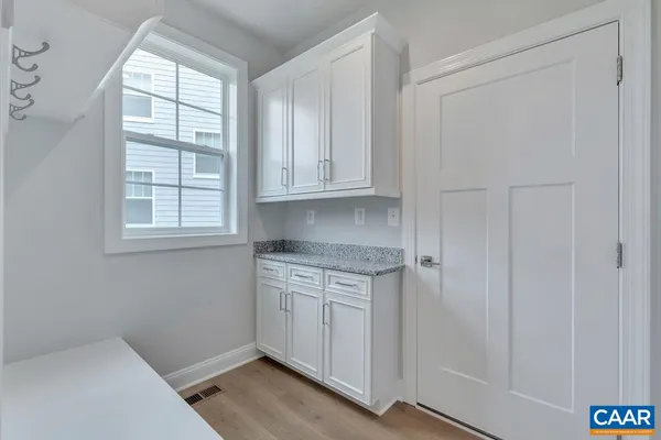 a view of livingroom with wooden floor