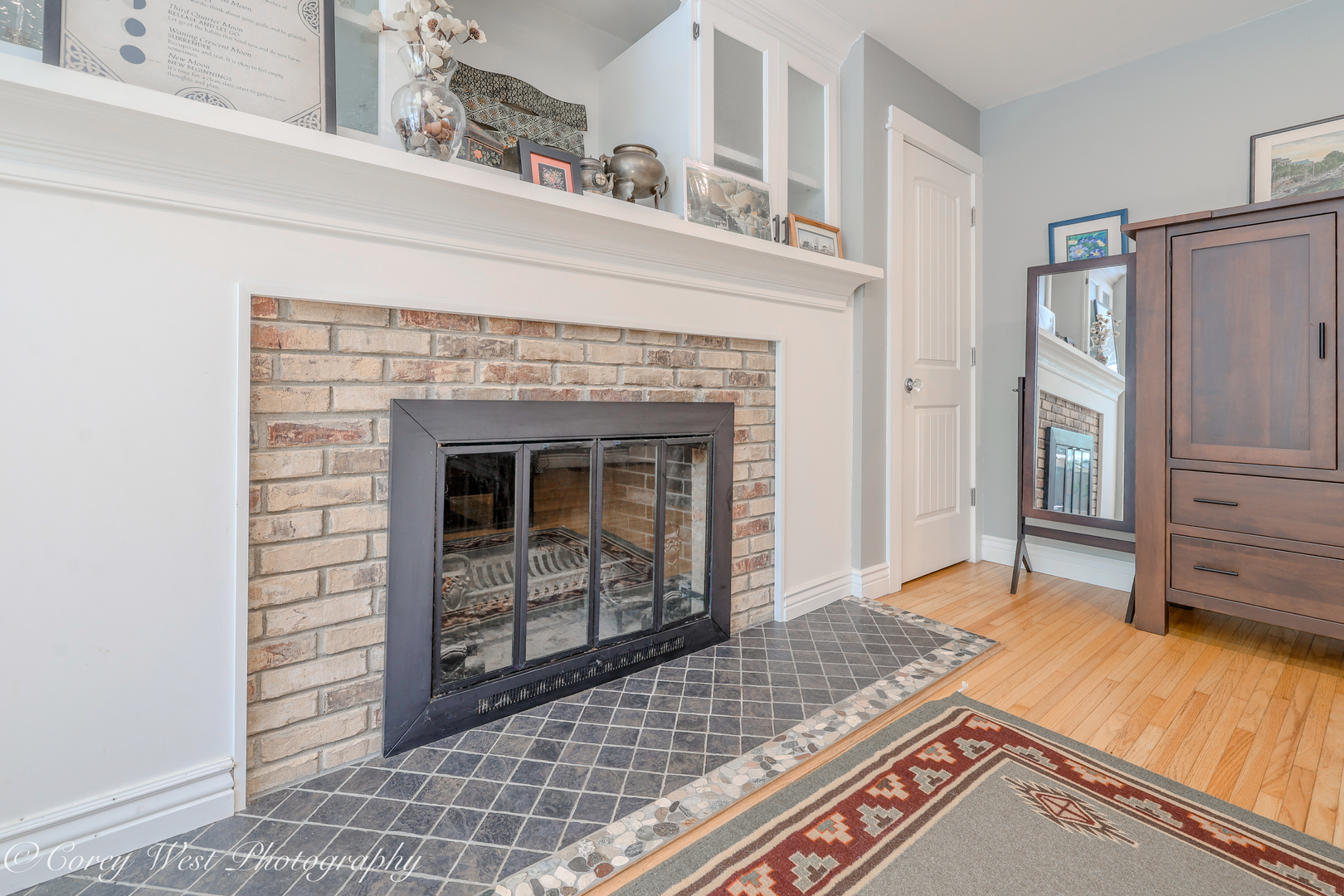 11N226 Peplow Road Hampshire, IL 60140 - Photo 16 of 44 a view of a livingroom with furniture and a fireplace