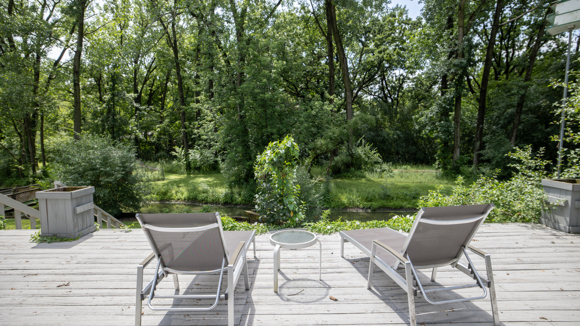11N226 Peplow Road Hampshire, IL 60140 - Photo 17 of 44 a view of a patio with table and chairs and potted plants