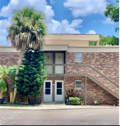 front view of a house with a garden