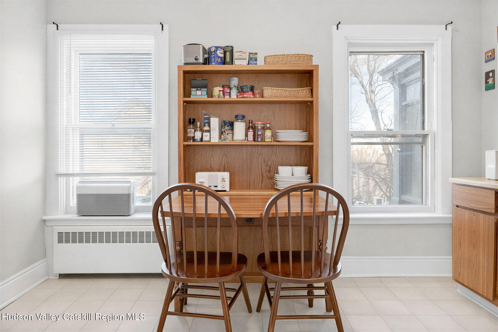 13 South Franklin Street, Unit 3 Athens, NY 12015 - Photo 15 of 55 a view of a dining room with furniture and a window