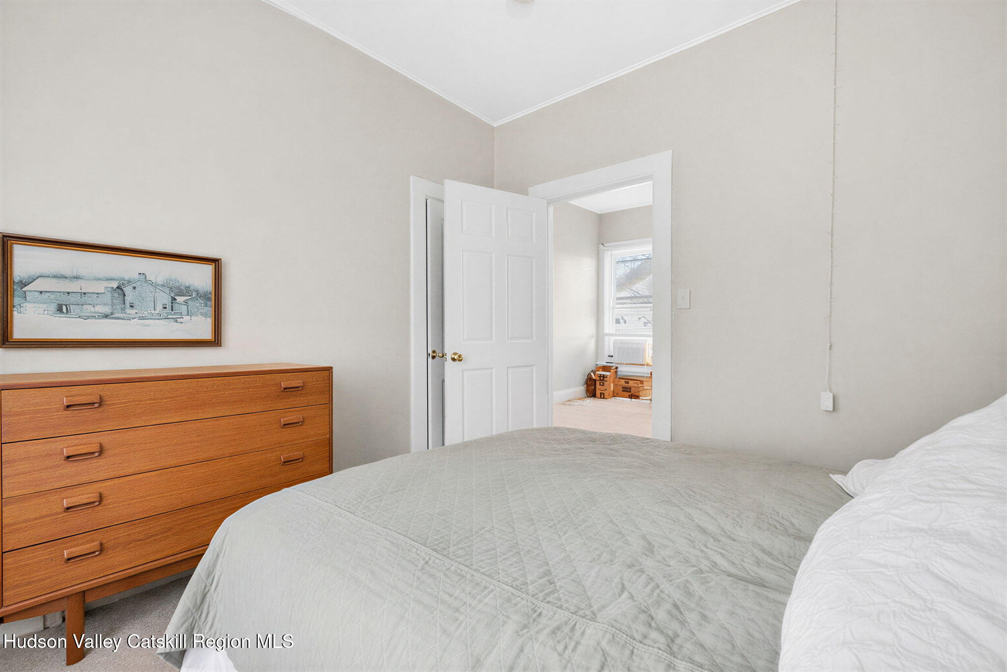 13 South Franklin Street, Unit 3 Athens, NY 12015 - Photo 16 of 55 a bedroom with a bed and a dresser