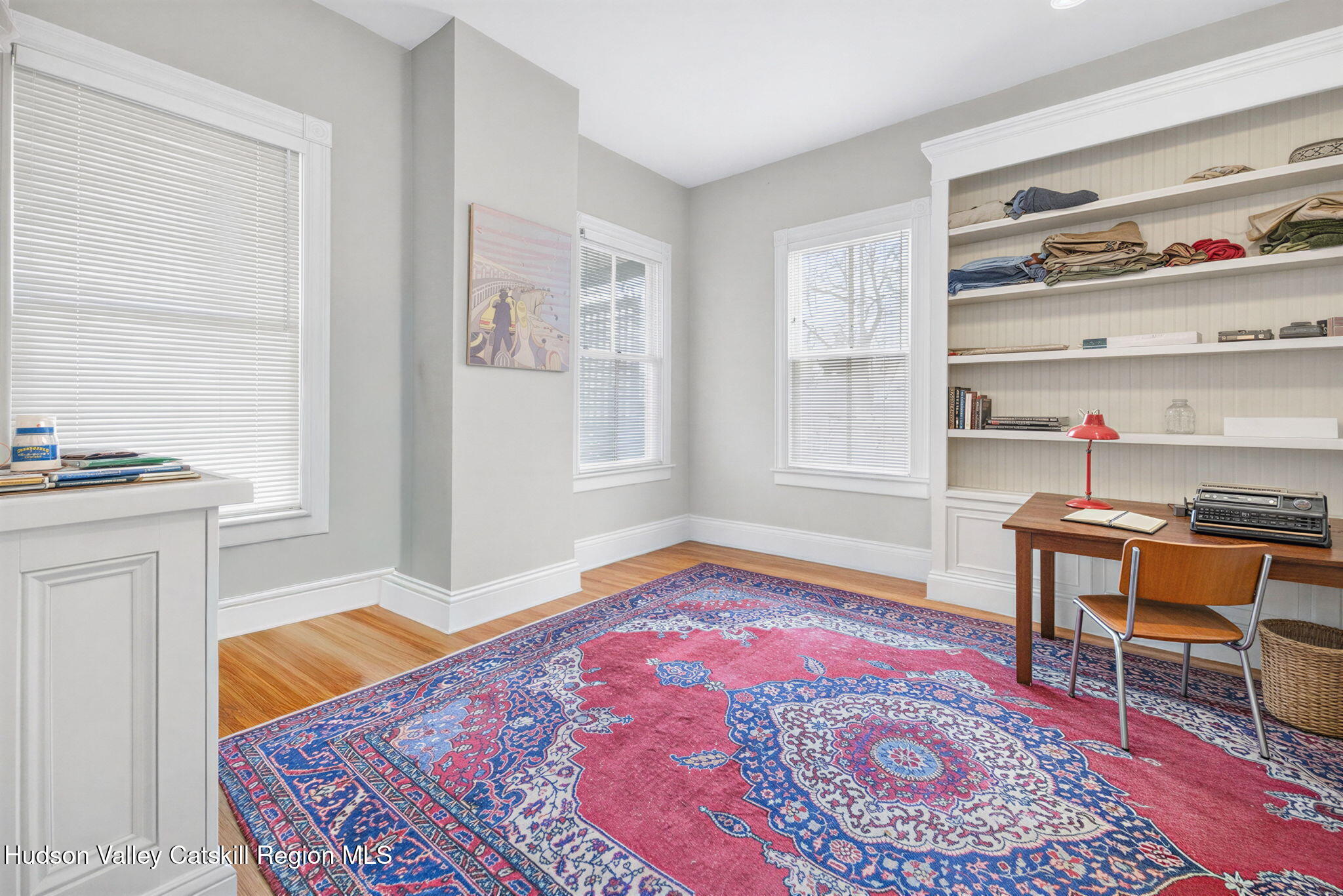 13 South Franklin Street, Unit 3 Athens, NY 12015 - Photo 25 of 55 a bedroom with a bed and a table in it