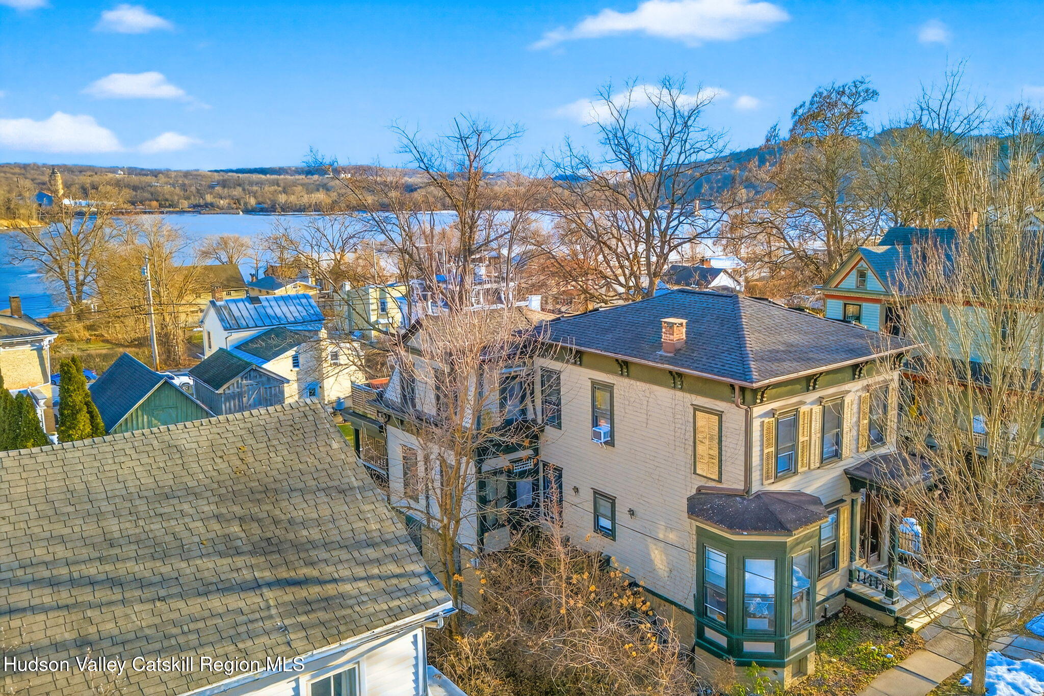 13 South Franklin Street, Unit 3 Athens, NY 12015 - Photo 47 of 55 a front view of a house with a yard and lake view