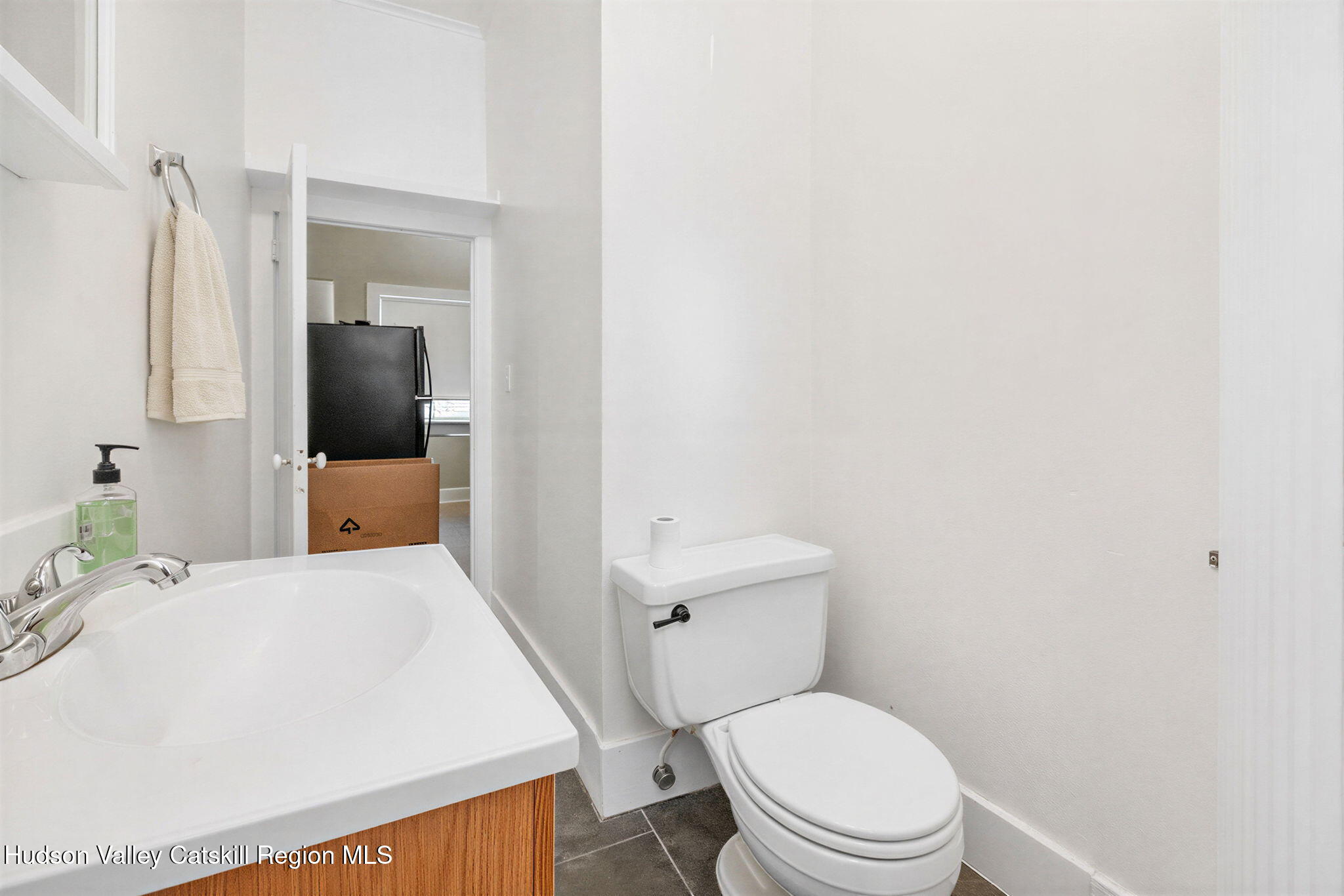 13 South Franklin Street, Unit 3 Athens, NY 12015 - Photo 10 of 55 a white toilet sitting next to a bathroom sink