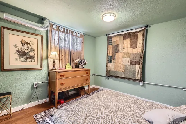 a room with furniture and a window