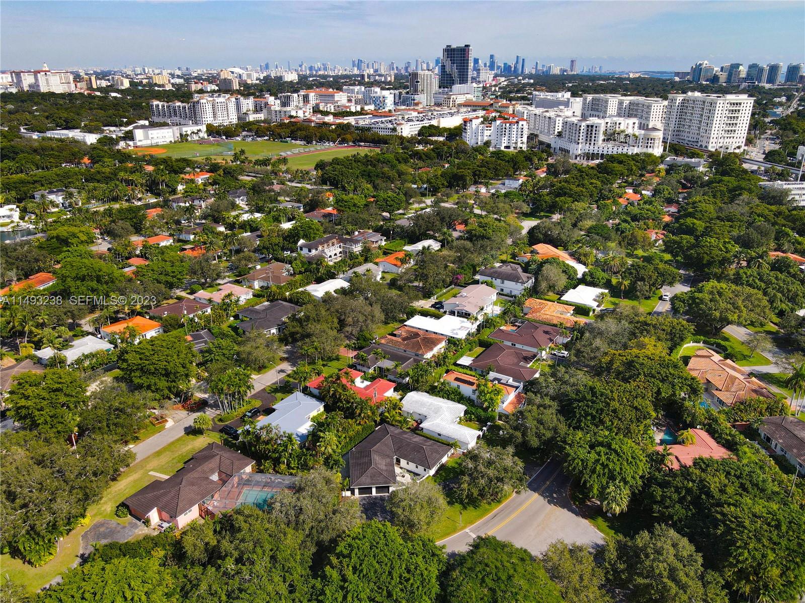 605 Blue Road Coral Gables, FL 33146 - Photo 32 of 34 an aerial view of residential houses with city view