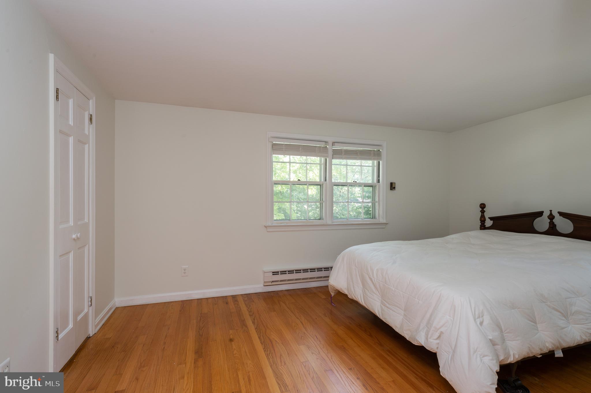 29 Wilson Road Princeton, NJ 08540 - Photo 17 of 25 Bedroom with Sliders to half Bath, Hardwood floors