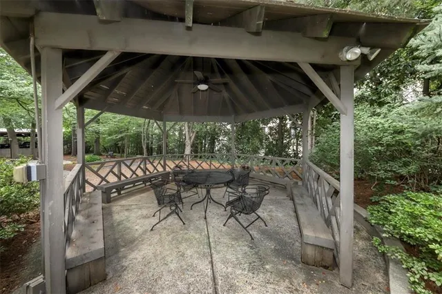 a view of a lobby with furniture and floor to ceiling window