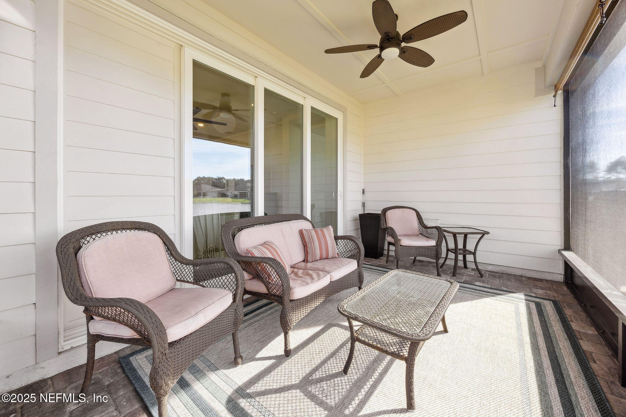 671 Jubilee Circle Yulee, FL 32097 - Photo 31 of 126 a living room with furniture and a window