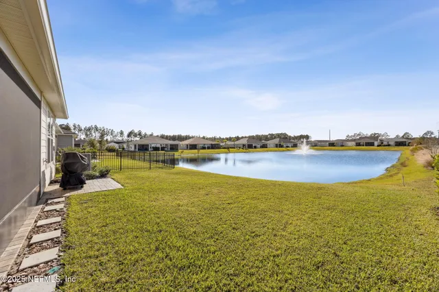 a view of a lake with houses