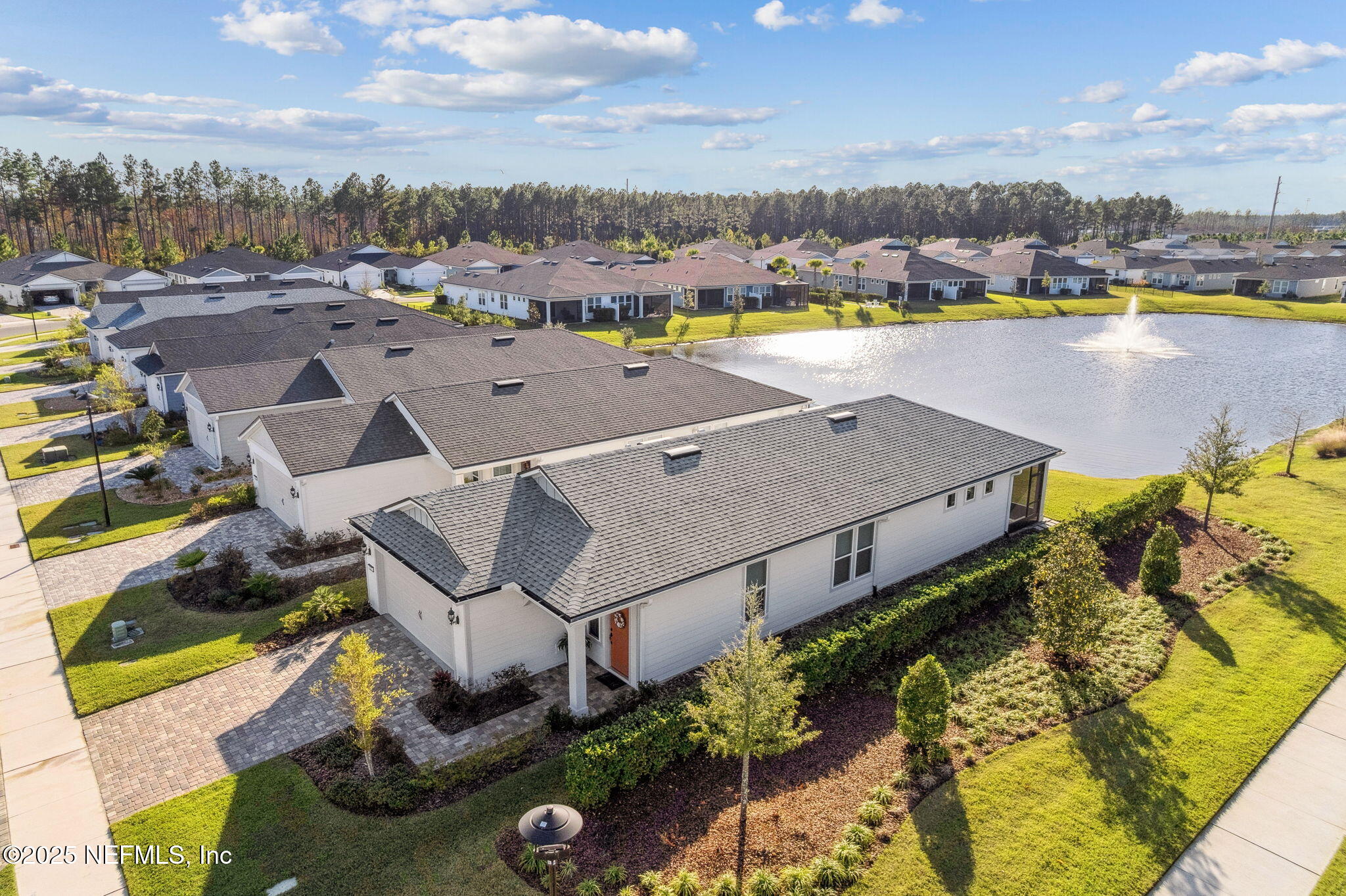 671 Jubilee Circle Yulee, FL 32097 - Photo 46 of 126 an aerial view of a house with a swimming pool yard and outdoor seating