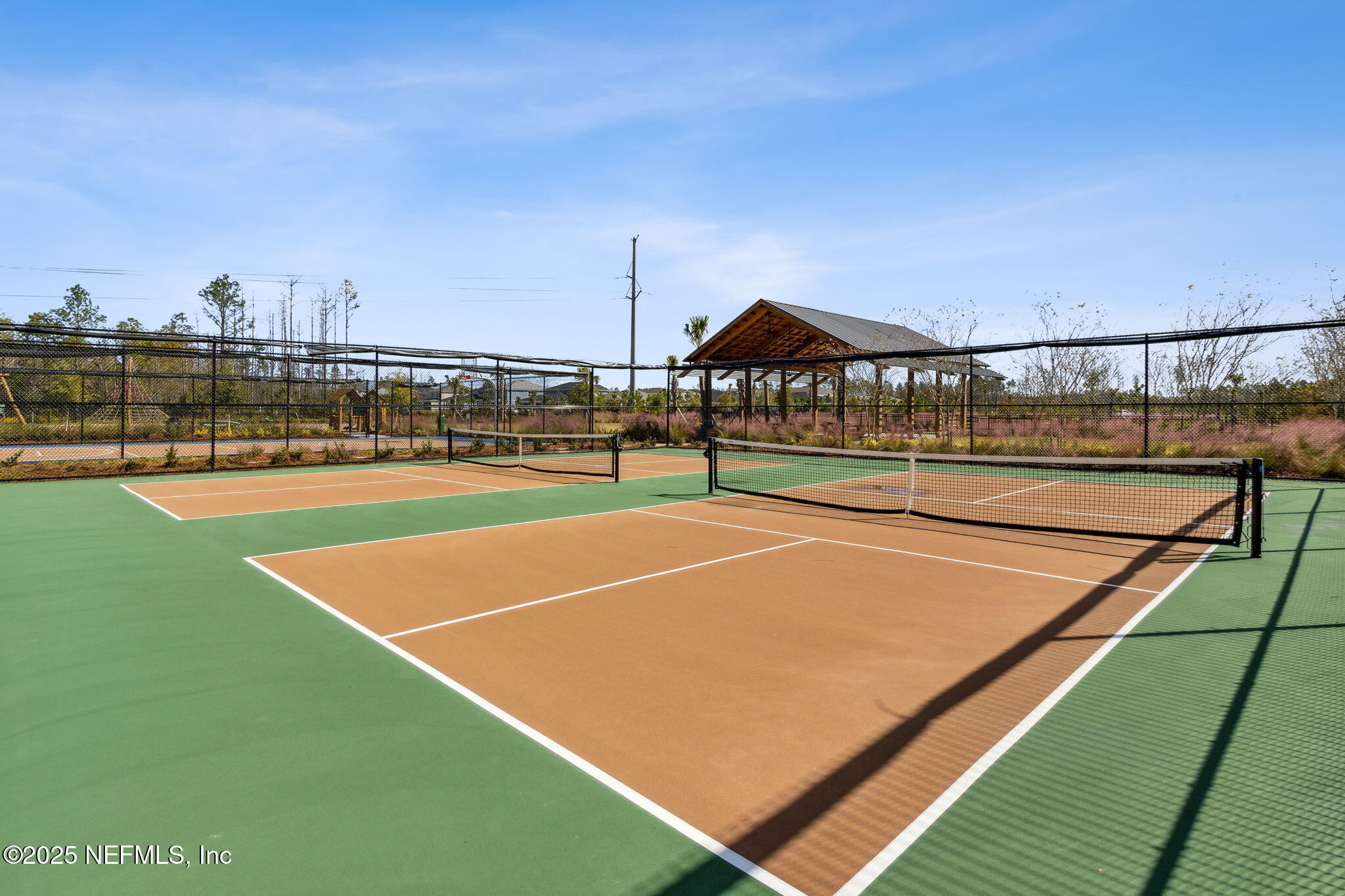 671 Jubilee Circle Yulee, FL 32097 - Photo 94 of 126 a view of a tennis court