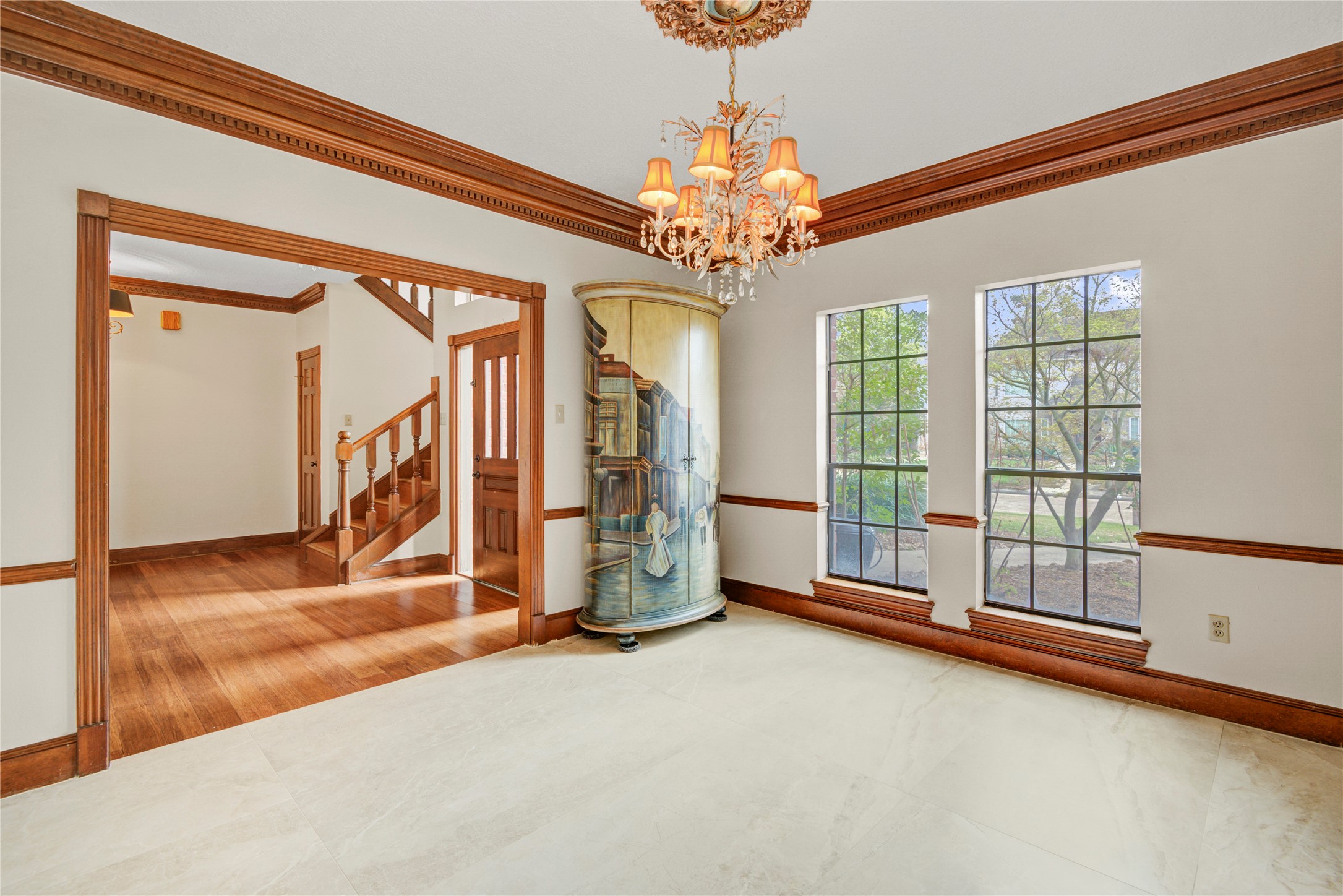8412 Hidden Trail Lane Spring, TX 77379 - Photo 9 of 43 From the dining room, enjoy an open view back toward the impressive foyer and staircase, creating a grand sense of arrival.