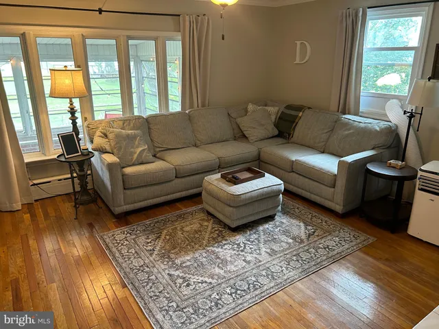 a room with a bed and a window