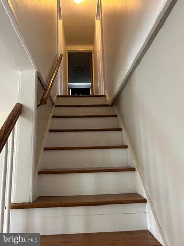 a bedroom with a workspace