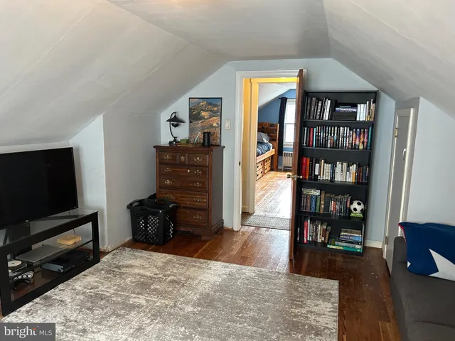 a room with furniture and a large window