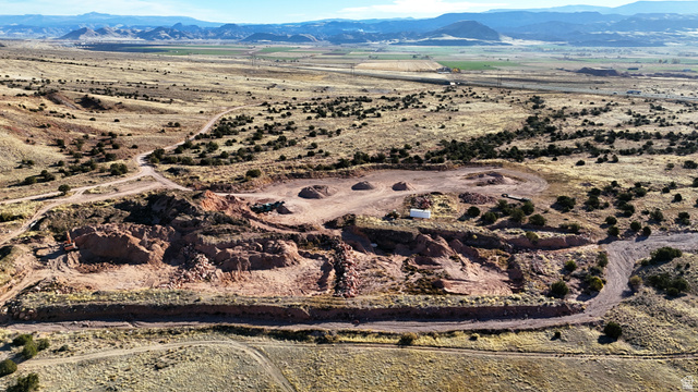 2600 Sevier Valley Canal Road Richfield, UT 84701 - Photo 20 of 63 Aerial overview of property's location with a mountain backdrop and rural landscape