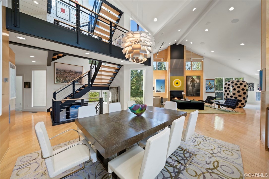 640 Walsing Drive Henrico, VA 23229 - Photo 5 of 37 a living room with furniture dining table a large window and potted plants