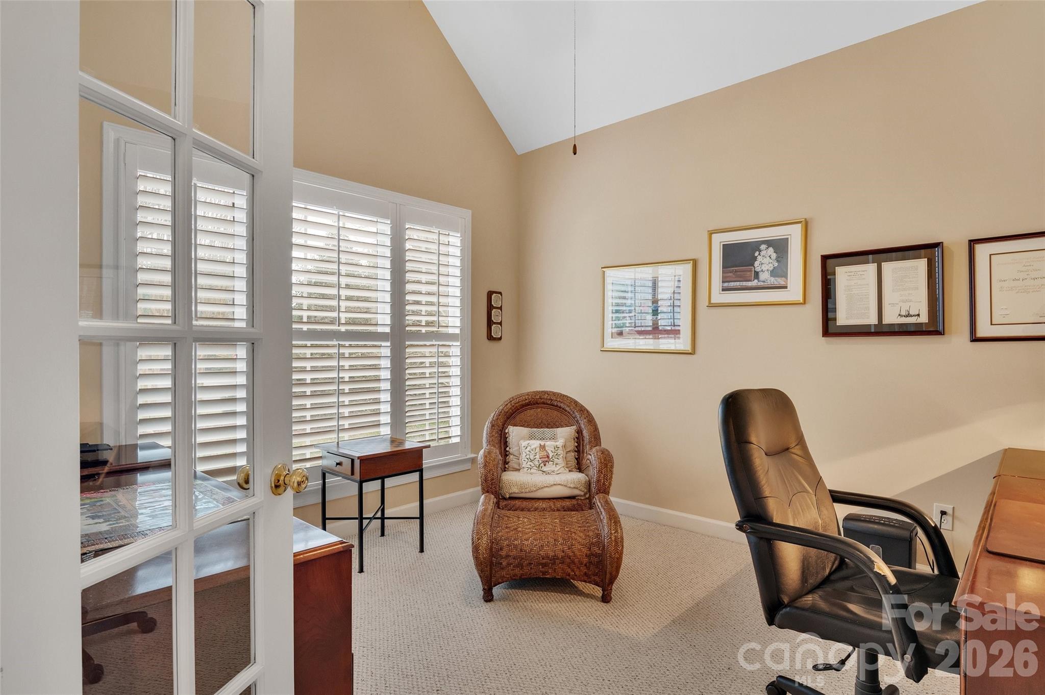 3001 River Bend Drive Tega Cay, SC 29708 - Photo 15 of 36 a view of a workspace with furniture and a window
