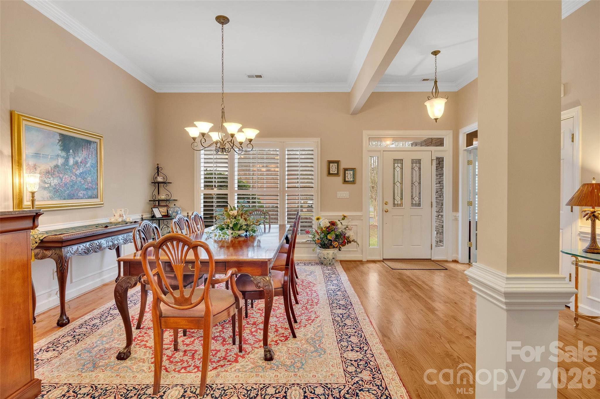 3001 River Bend Drive Tega Cay, SC 29708 - Photo 5 of 36 a view of a dining room with furniture and window