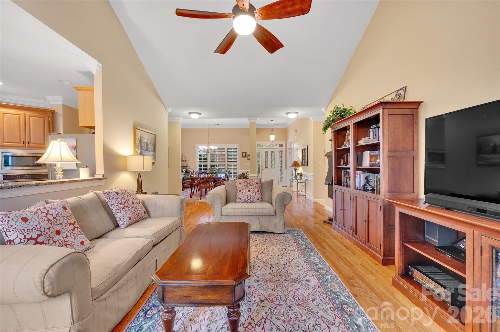 3001 River Bend Drive Tega Cay, SC 29708 - Photo 7 of 36 a living room with furniture and a flat screen tv